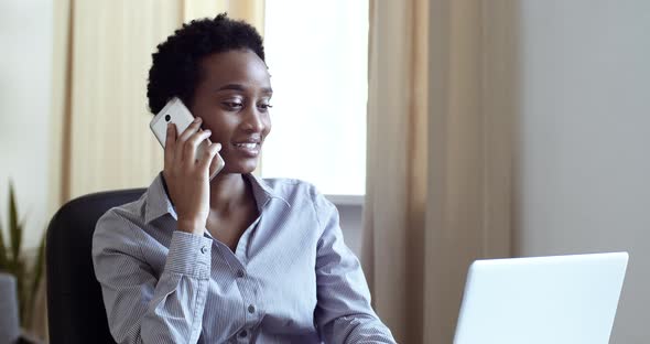 Serious Attractive African American Business Woman Student Girl Freelancer Talking on Phone alt