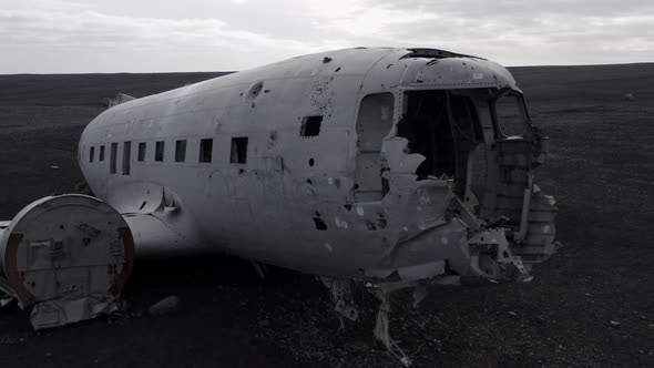 Aerial of an Abandoned Crashed Plane Wreckage on Solheimasandur Beach Iceland alt