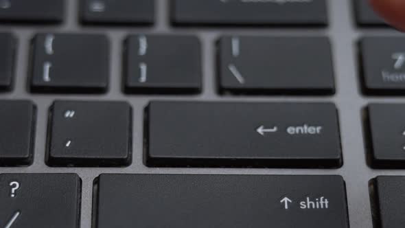 Enter Button Pressing on Keyboard Laptop Keyboard Close Up alt