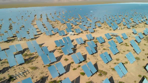 Low Aerial of Solar Electric Generators in Desert alt