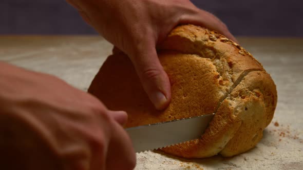 Cutting Bread with Knife Slowmotion