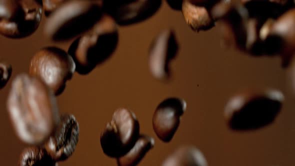Roasted Coffee Beans Falling Down in Super Slow Motion alt
