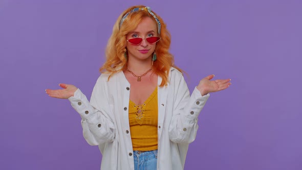 Seductive Cheerful Stylish Girl in White Shirt Wearing Sunglasses Charming Smile on Purple Wall alt