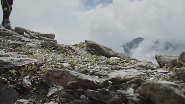 Man Trail Running in a Big Mountains