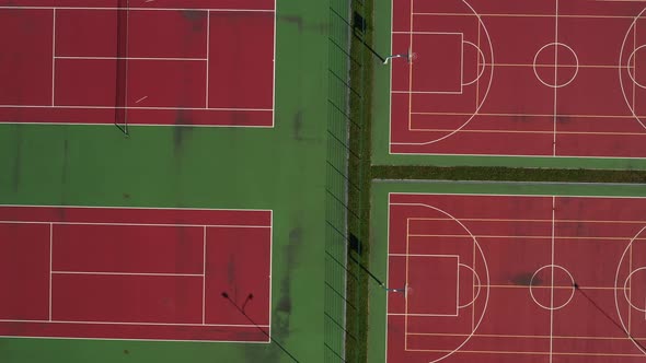 View From the Height of the Empty Tennis Courts in the Daytime in Summer