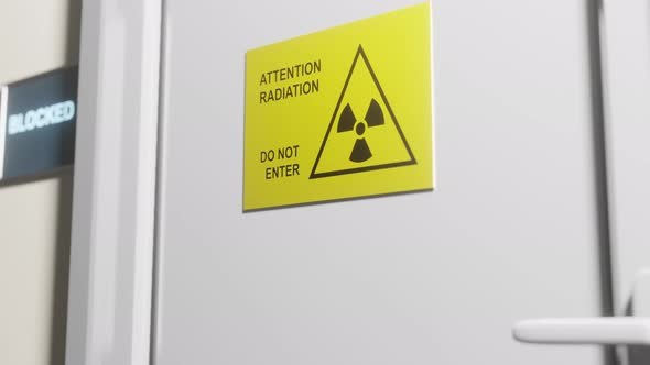 A locked door to a room with a radiation symbol. alt