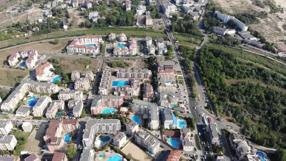 Aerial footage of the beautiful town centre of Sunny Beach in Bulgaria alt