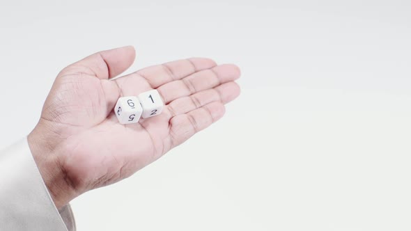 Hand Holds Numbered Dice Six And One Sixty One 61 alt