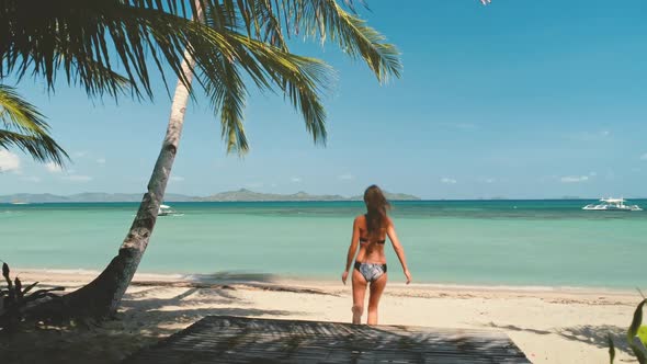 Woman on Tropical Beach Maldives Island