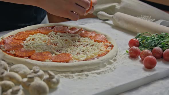 Professional Baker Prepares Traditional Italian Pizza
