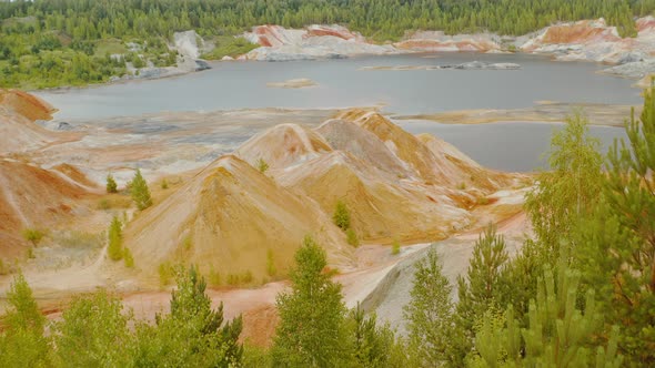 A man descends the mountain slope Ural Mars A view of the beautiful landscape alt