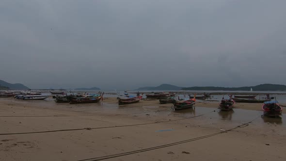 Low Tide Stormy Dusk At Tropical Fishing Beach: Phuket, Thailand - 2.7k  alt