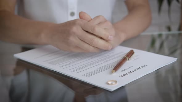 Divorce decree on the table.  alt