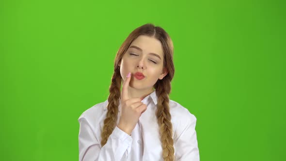 Schoolgirl Thinks She's Smart. Green Screen, Stock Footage | VideoHive