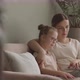 Mom and Daughter Watching Film on Laptop - VideoHive Item for Sale