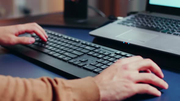 Close Up of Engineer Hands Typing on Keyboard alt