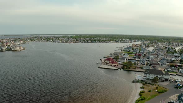 Drone Wide View of Local Residential Suburb of River in View of Distant Toms River alt