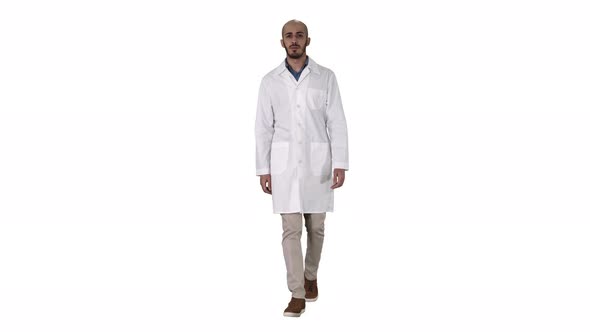Friendly Male Doctor Walking and Talking Looking in Camera on White Background. alt