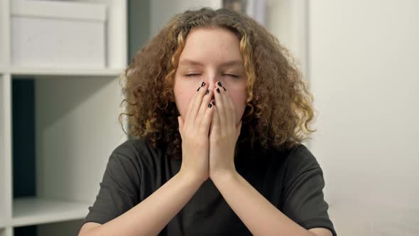 Portrait of a Teenage Girl Who Sneezes alt