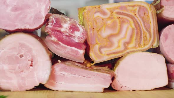 Meat and sausage products, pork, ham lie on the table