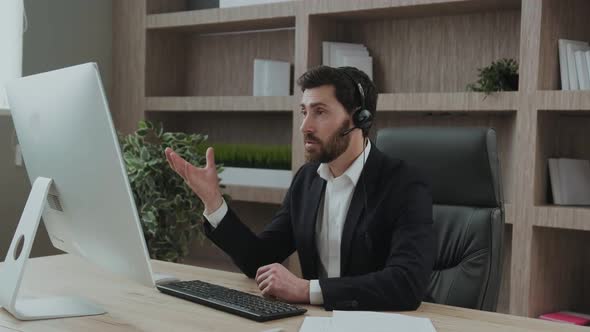 Smartlooking and Representive Middleaged Business Consultant Leads a Session Online Conference From alt