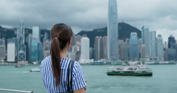 Woman look at view in Hong Kong alt