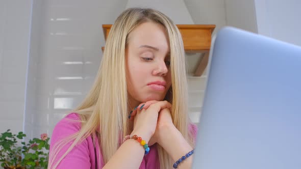 Stressed freelancer woman in thoughts about distant work and problems alt