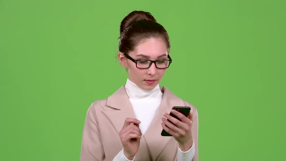 Girl Office Manager Is Happy To Win the Lottery. Green Screen. Slow Motion alt