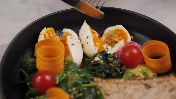 Halved Eggs on Wooden Background Close-up Shot Salad Vegetables alt