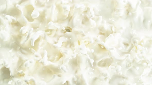 Super Slow Motion Shot of Swirling Fresh Cream at 1000Fps alt