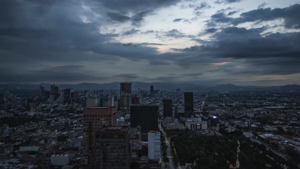 Timelapse of Mexico City on top of Torre Latinoamericana going into Nighttime. alt