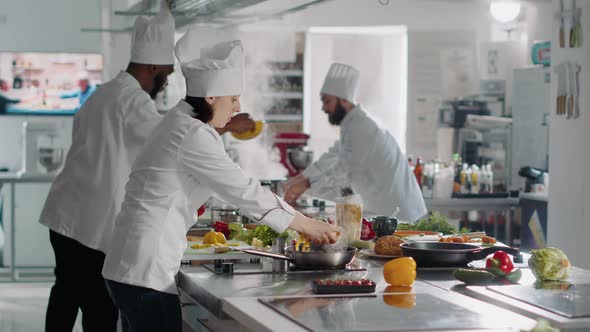 Professional Chef Preparing Bell Pepper Ingredient on Cutting Board alt