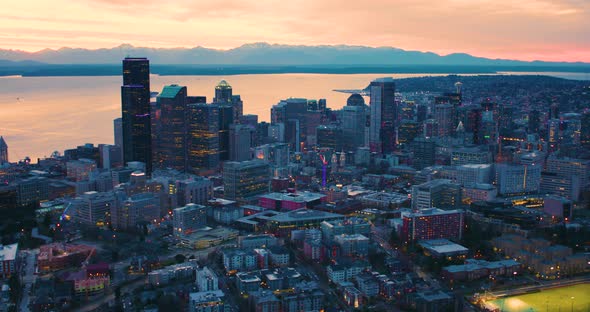 Seattle Washington Aerial Skyline At Night Sunset Moody Sky Metropolis Urban Cityscape alt