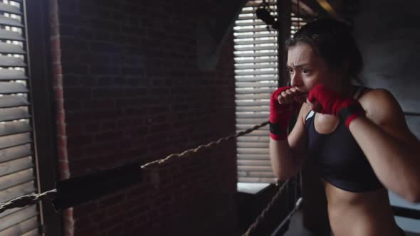 Athletic Aggressive Sporty Woman in Gym alt