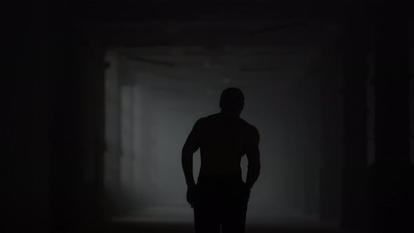 Fitness Man Running in Dark Corridor, Stock Footage | VideoHive