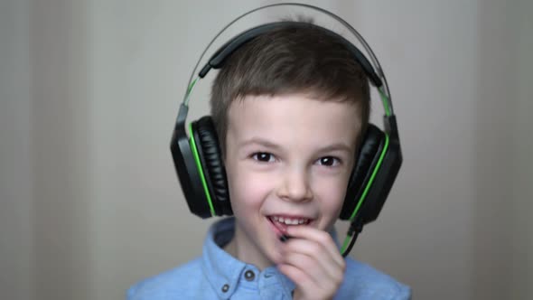 Portrait Boy Wear a Headphone at Home