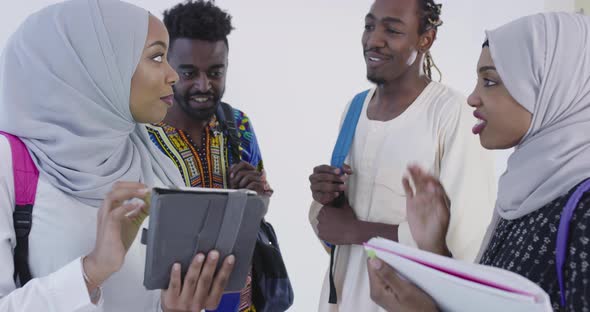 African Students in Traditional Clothes Planing and Preparing for Activity at University alt