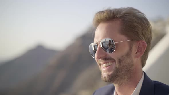 Smiling Handsome Man With Sunglasses Face