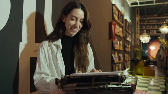 Secretary at Old Typewriter alt