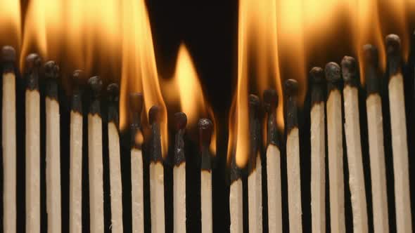 Row of burning matchsticks
