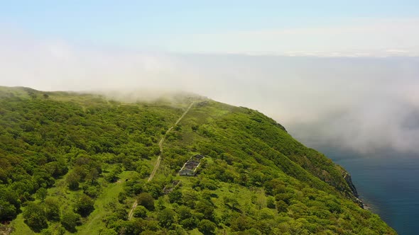 Mystical Island Askold Shrouded in Morning Mist alt