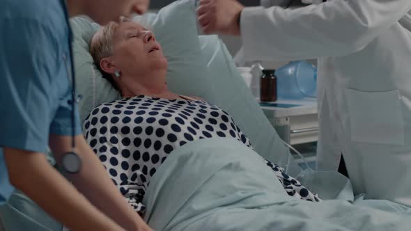 Old Patient with Respiratory Problem Getting Assistance alt