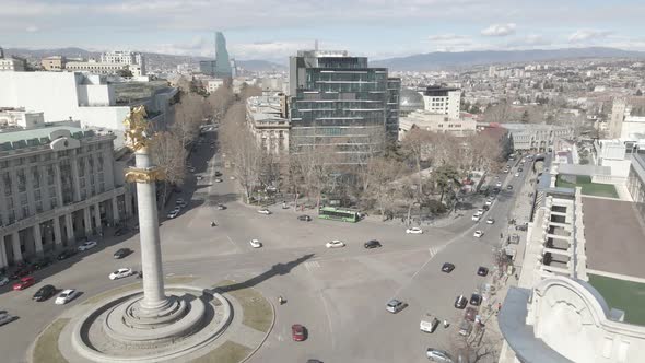 Flying over column of freedom in the center of Tbilisi, Georgia alt
