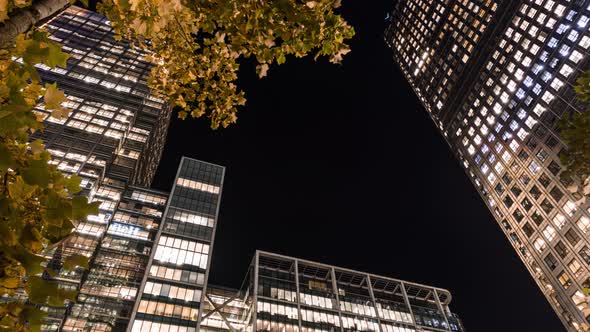 Modern office building time lapse with lights