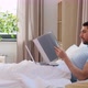 Man with Laptop Working in Bed at Home Bedroom - VideoHive Item for Sale