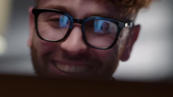 Smiling Hipster Man Greets the Person To Talk To