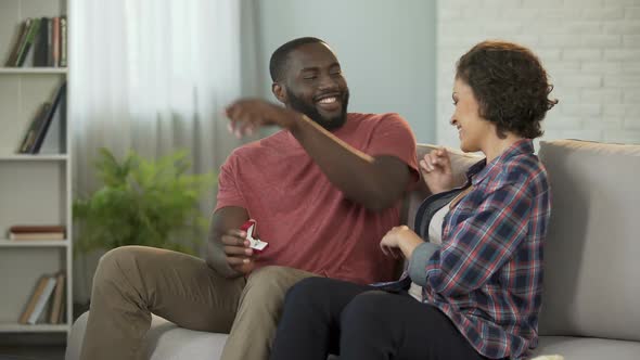 Caring Man Giving His Beloved Woman Ring for Their Anniversary, Unexpected Gift alt