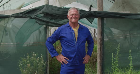 Mature man working on farm alt