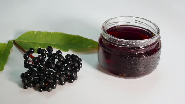 Freshly Squeezed Elderberry Juice, Black Berry On A White Background, Medicinal Herbal Infusion