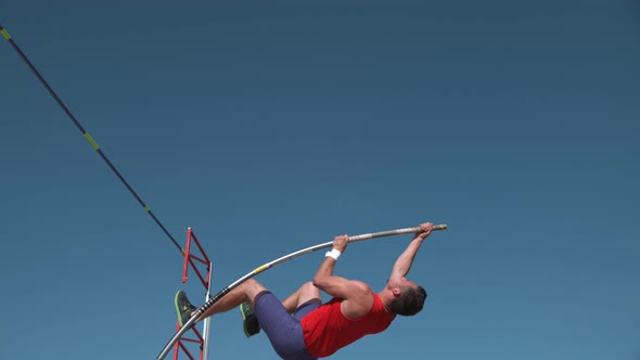 Track athlete doing pole vault in super slow motion, shot on Phantom Flex 4K